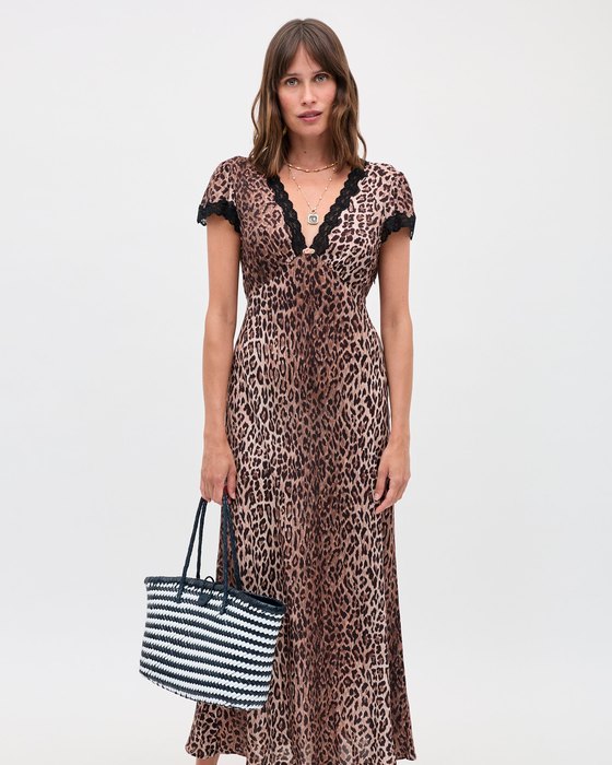 A leopard-print dress on a hanger.